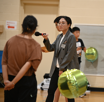 Ningshi Yao with students at the ARCup in Gaithersburg, Maryland.